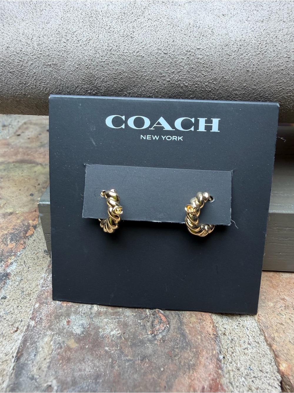 COACH Gold Twisted C Huggie Hopp Earrings - Picture 2 of 5